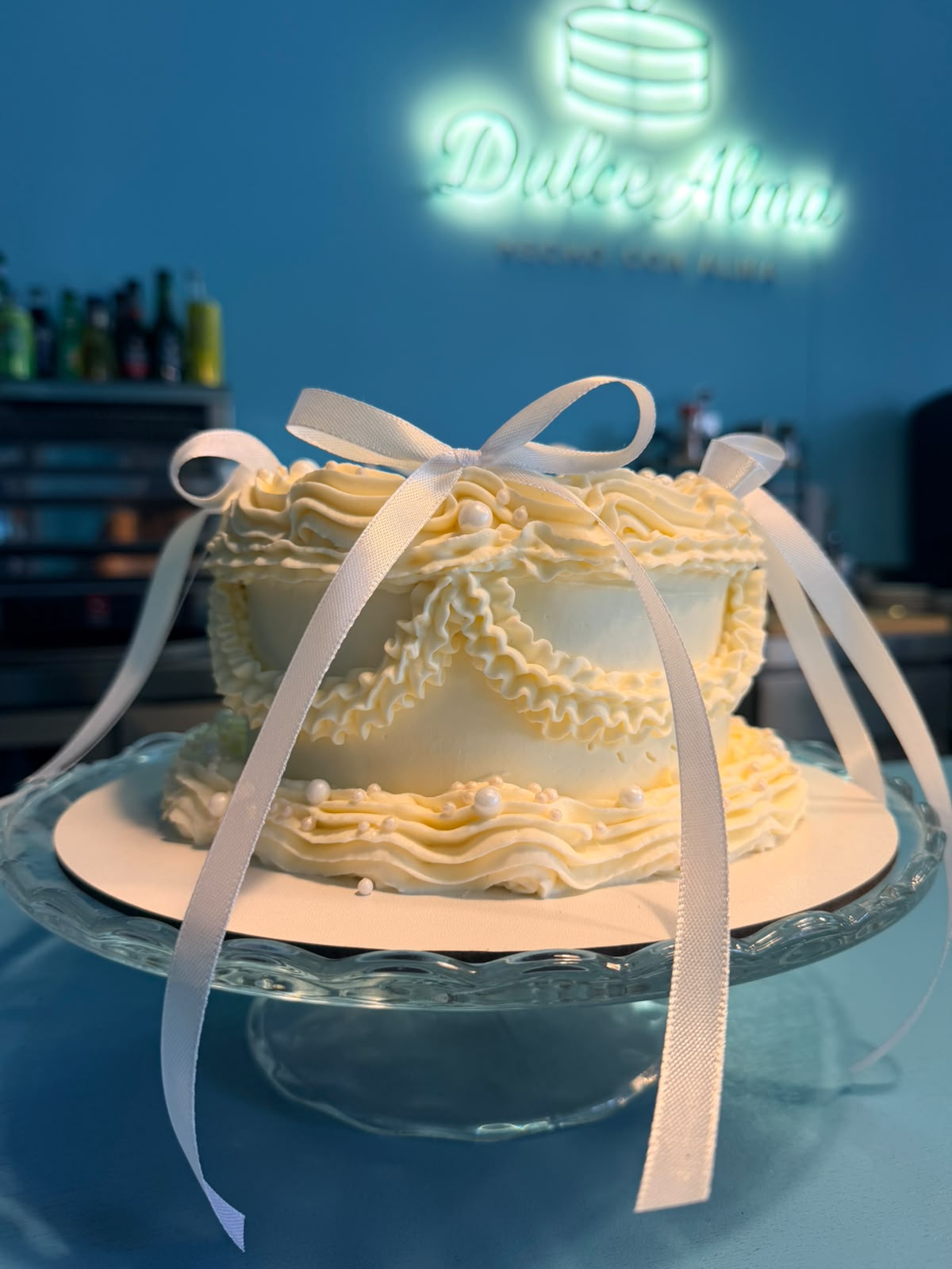 Ivory ribbon & pearls cake